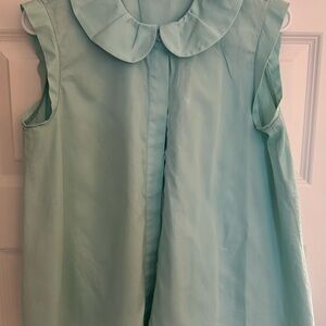 Think spring 2025! TaraJarmon Spa blue slvless covered button placket